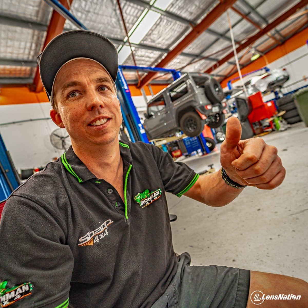 Brand of Sharp 4x4 gives a thumbs up to the special bar. He also owns a lime green Jimny