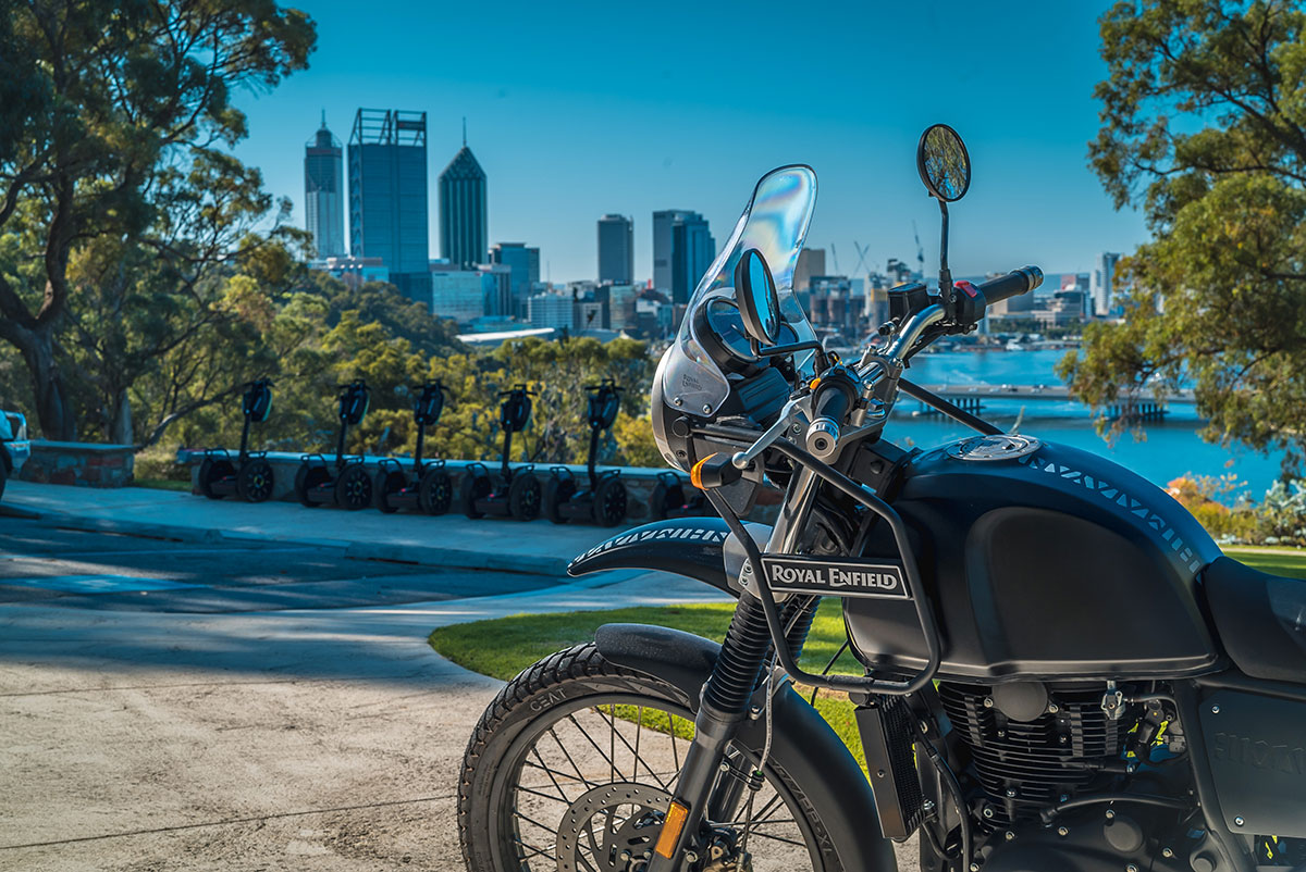 Royal Enfield Himalayan overlooking Perth city skyline