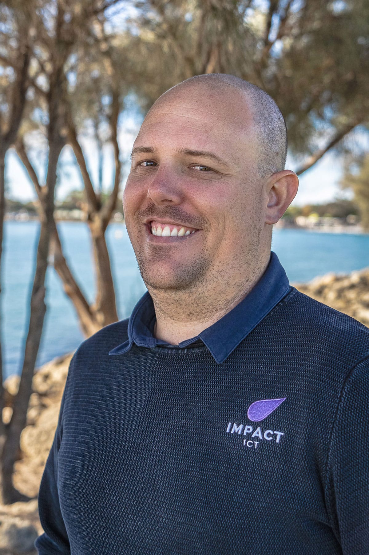 Corporate headshot of Tom Purser