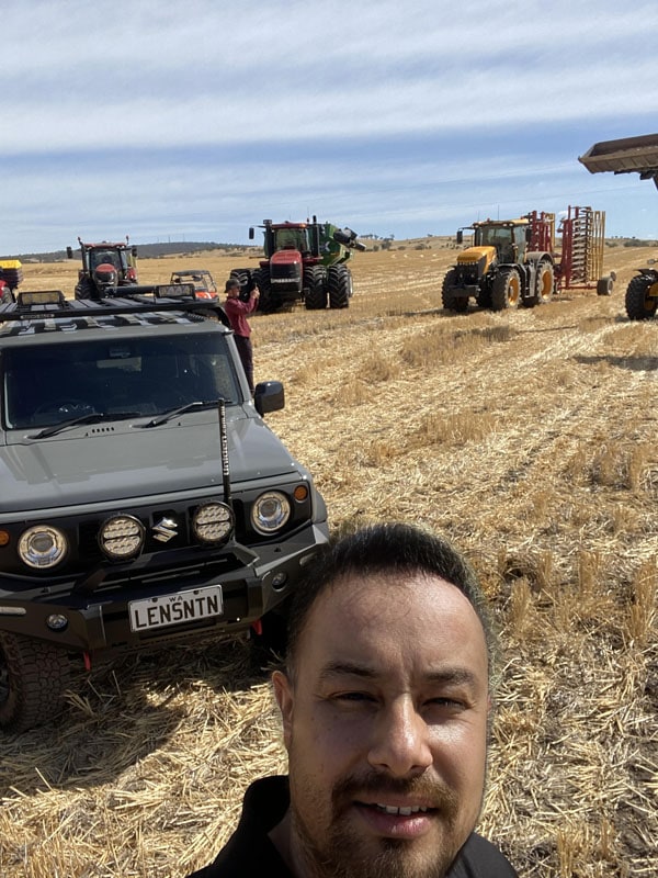 Lensnation Jimny with bigger machines in the paddock during the shoot