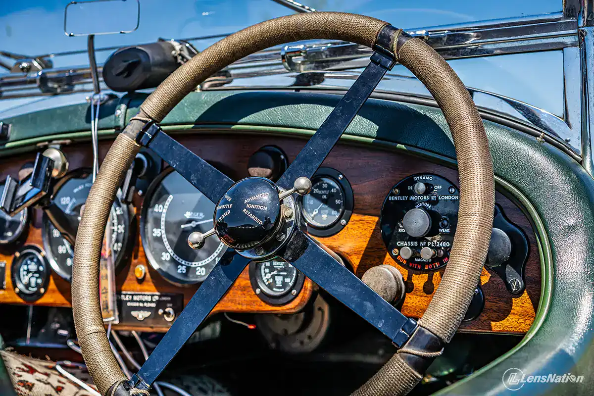 Bentley 1929 cockpit interior showing analog gauges and steering wheel
