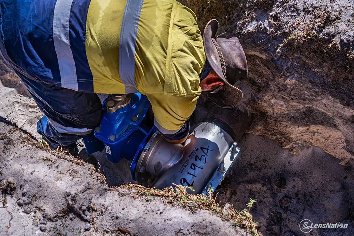 On-site industrial photography of hot tapping water mains in Perth