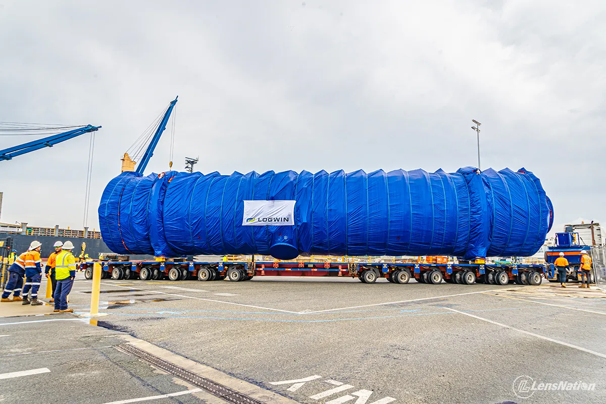 Heavy mining machinery being positioned for transport during industrial logistics operation