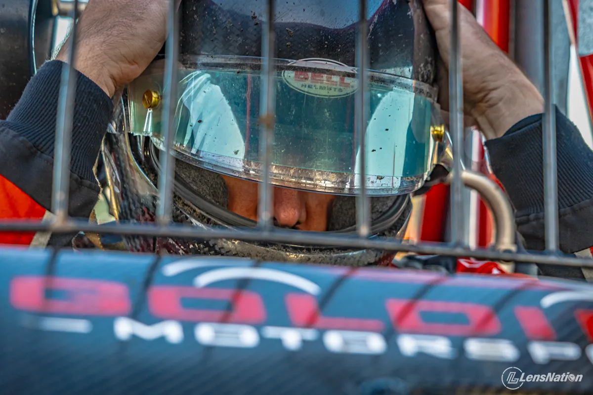 Speedcar driver preparing for competition at a WASDA speedway event