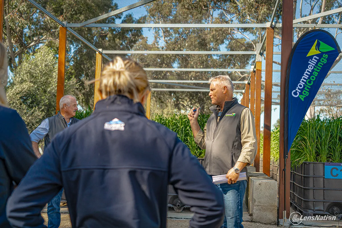 Hein de Villiers addressing Fertilizer Australia delegates with Crommelin Agricoatings branding in the background 