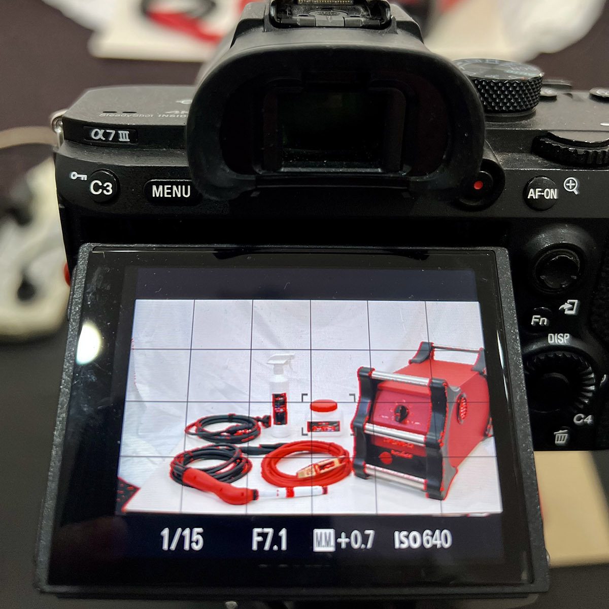 Behind the scenes commercial product photography capturing welding equipment on white background in Perth studio