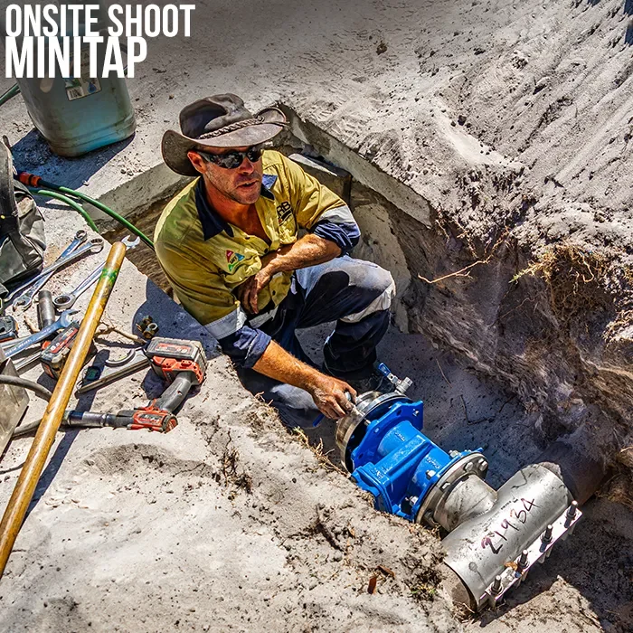 On-site industrial photography of hot tapping water mains in Perth
